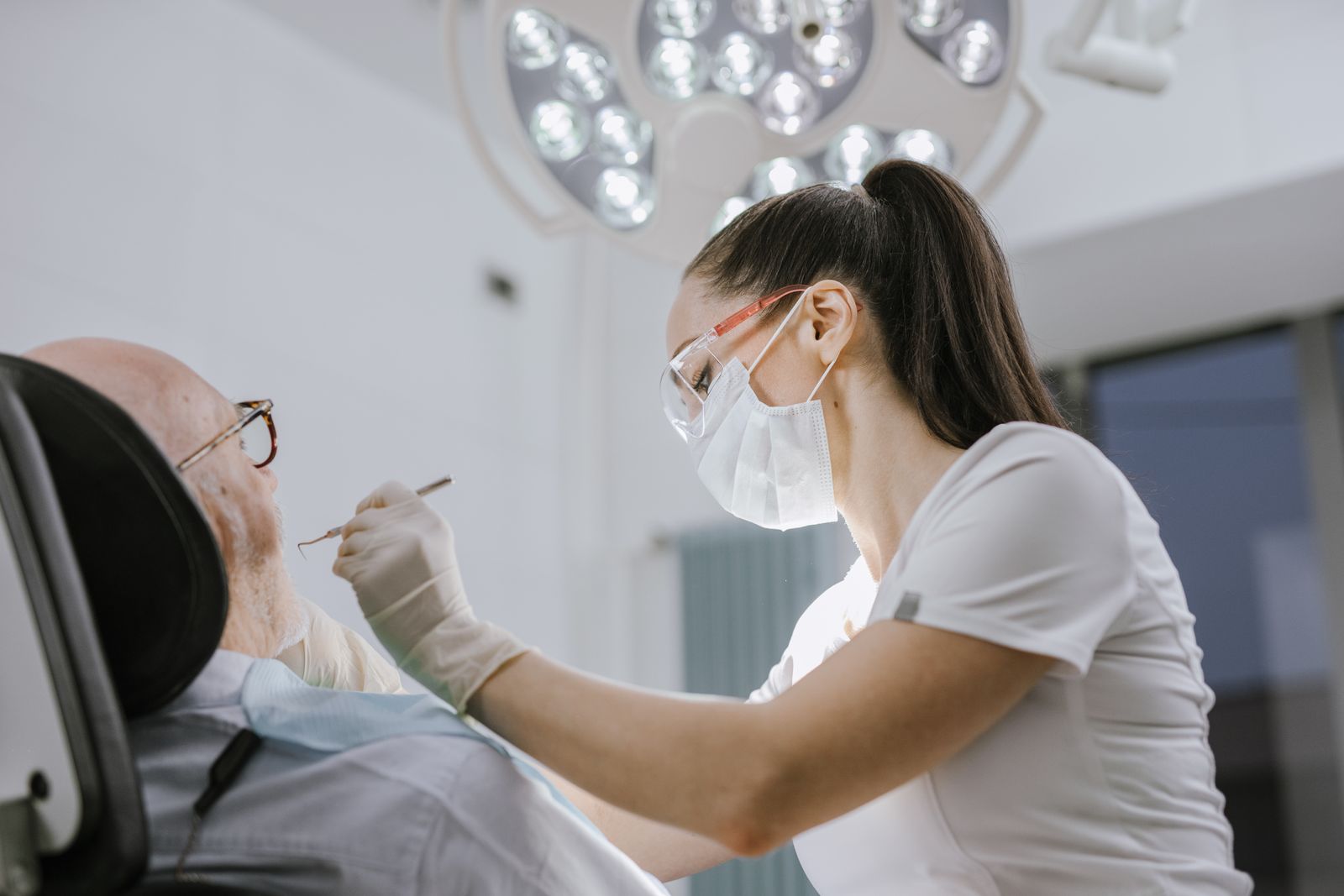 Dentist examining a child's teeth