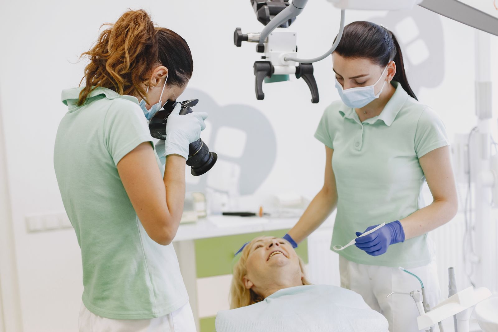 Dentist performing root canal treatment on a patient