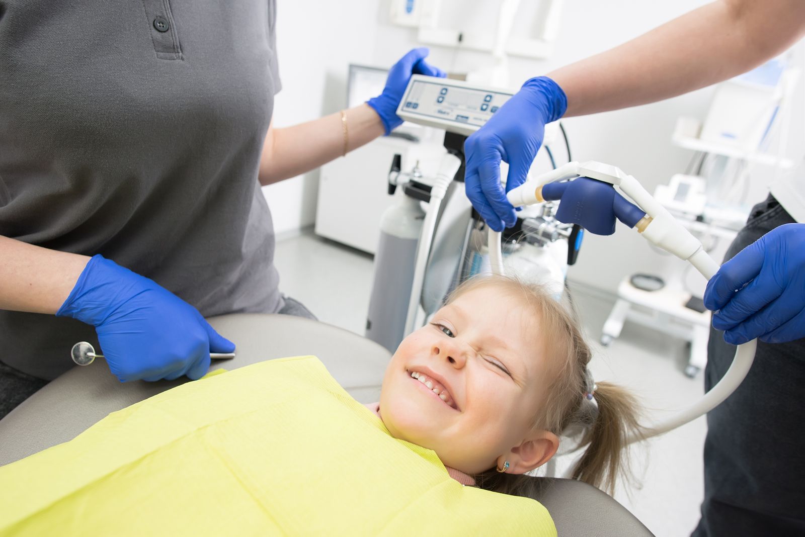 Patient smiling during a dental appointment
