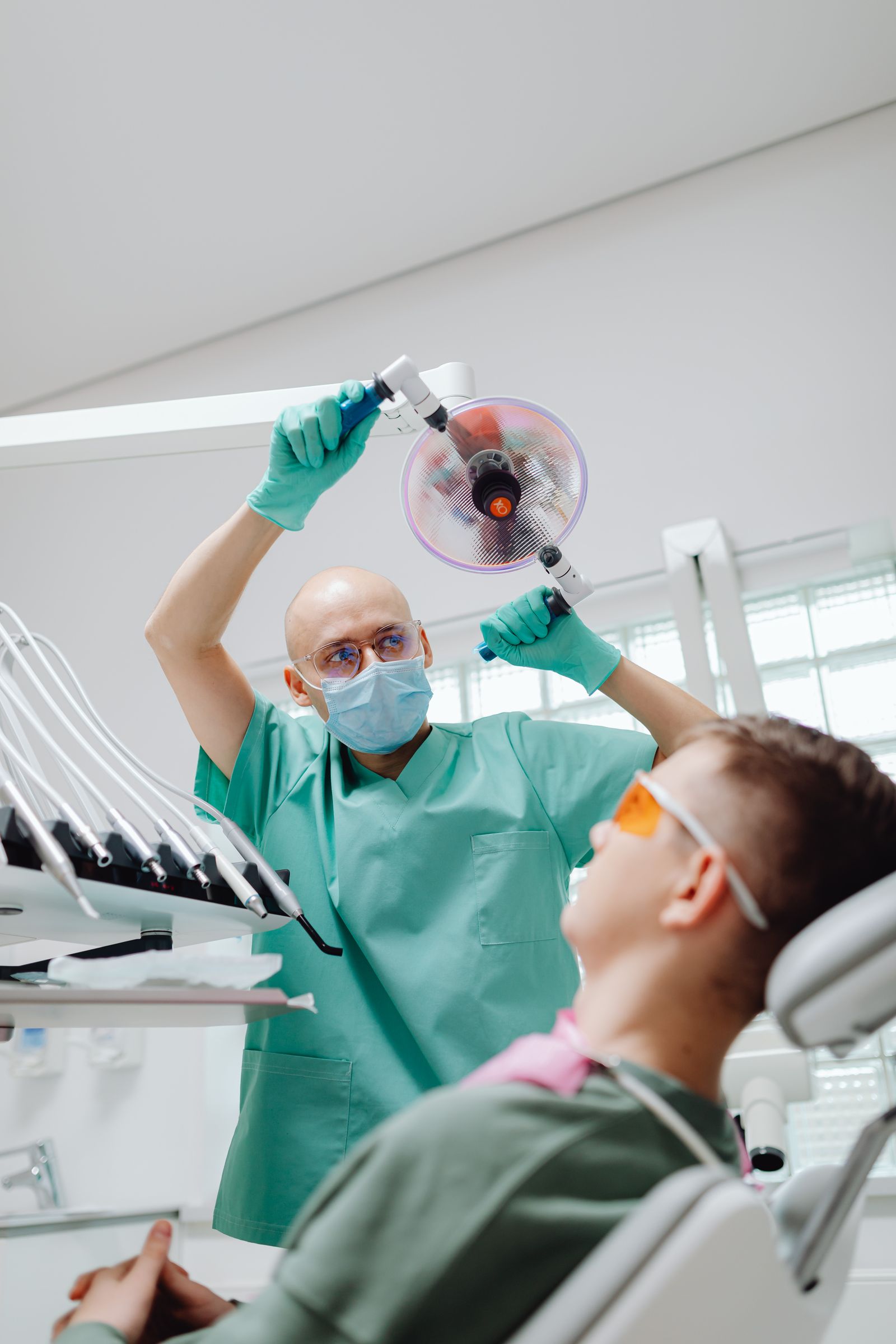 Dentist caring for a patient during a tooth extraction